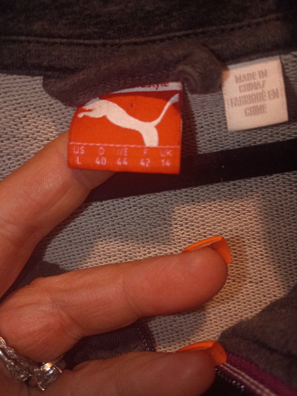 PUMA Women's Gray Hoodie with Orange Logo Tag